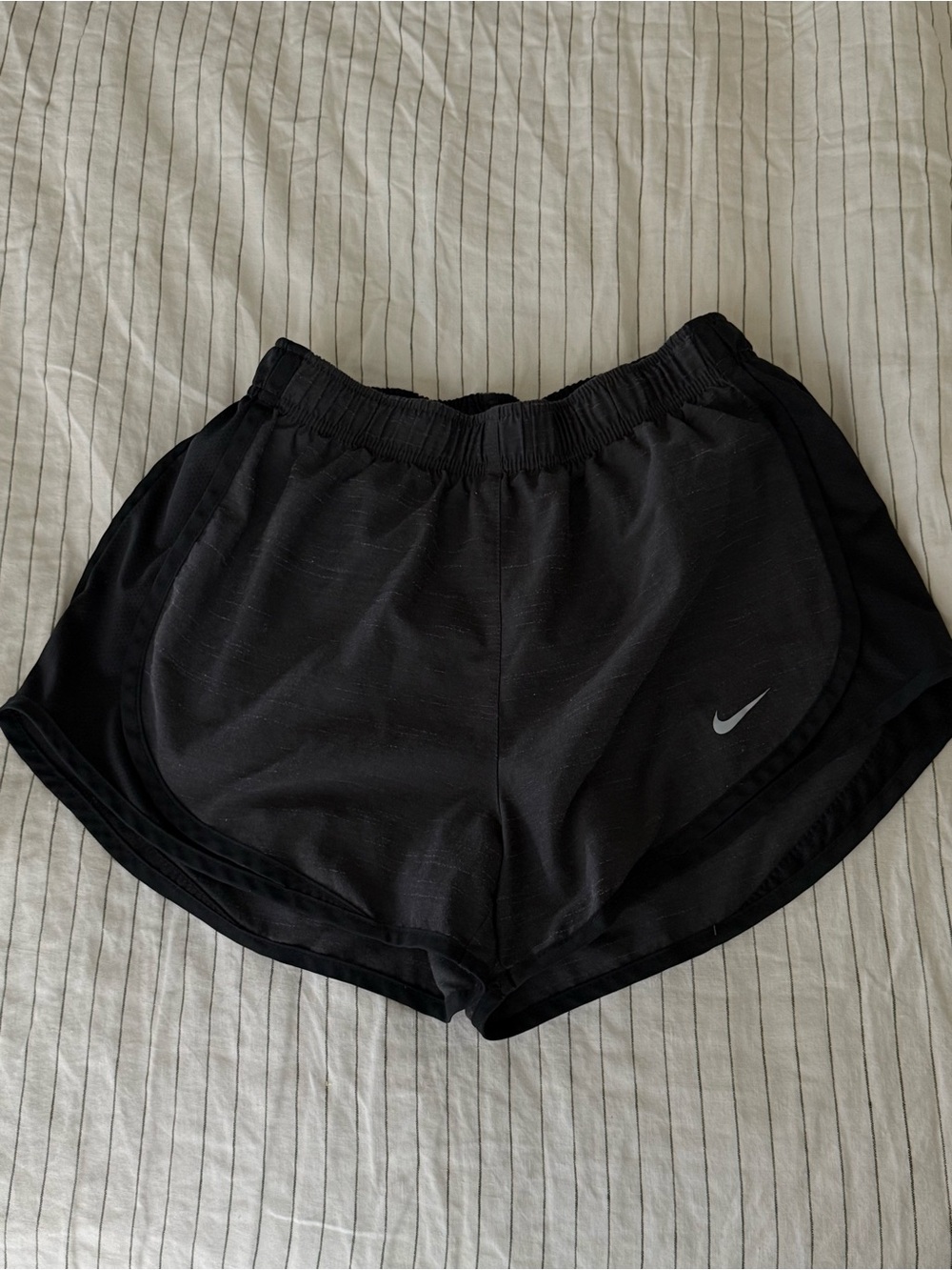 Nike Women's Black Athletic Shorts with Silver Swoosh